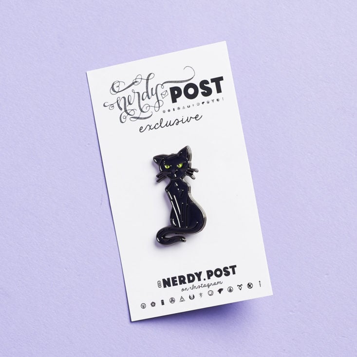 black cat enamel pin on backing