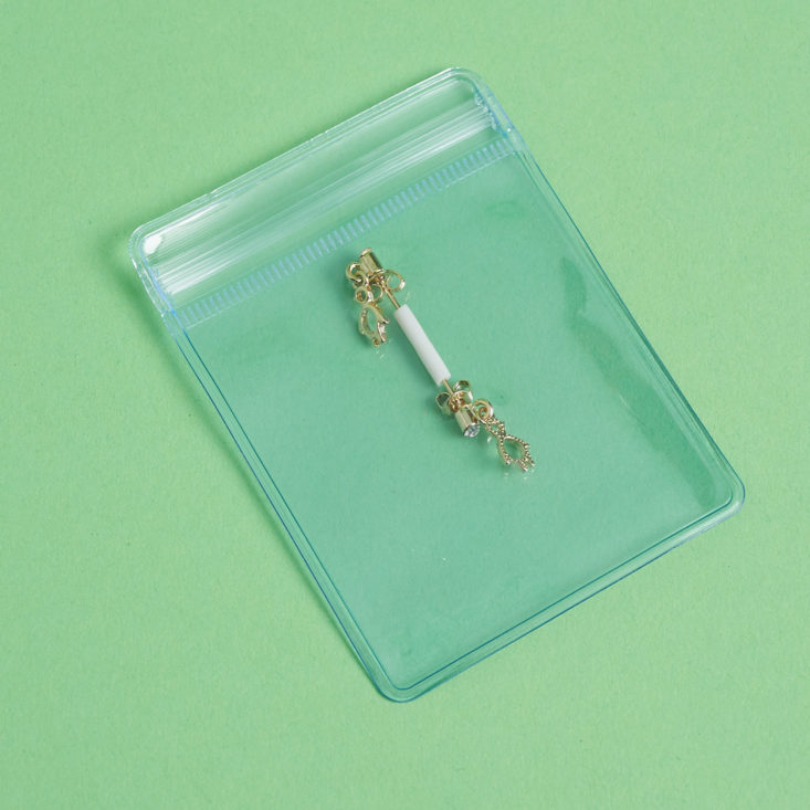 earrings in plastic pouch