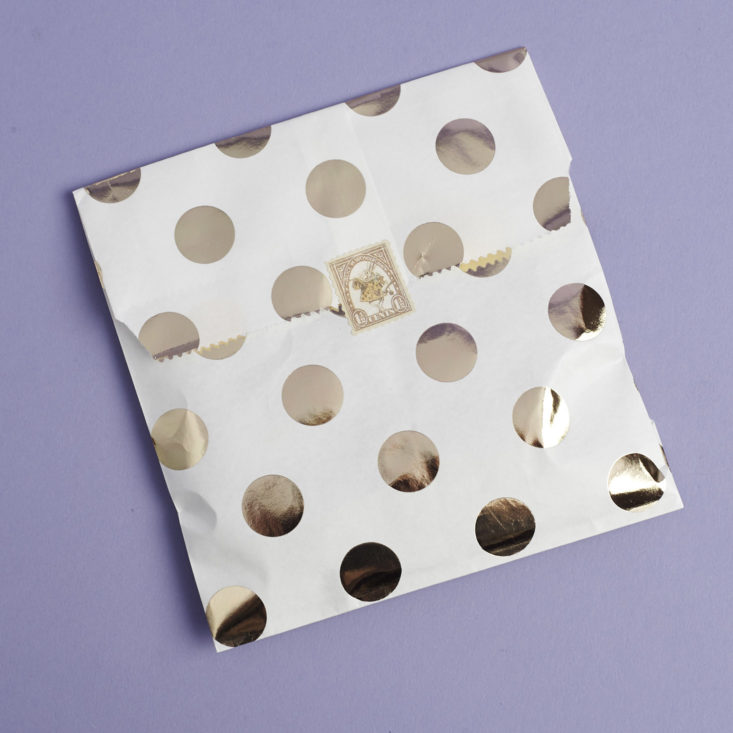 gold metallic polka dot gift bag