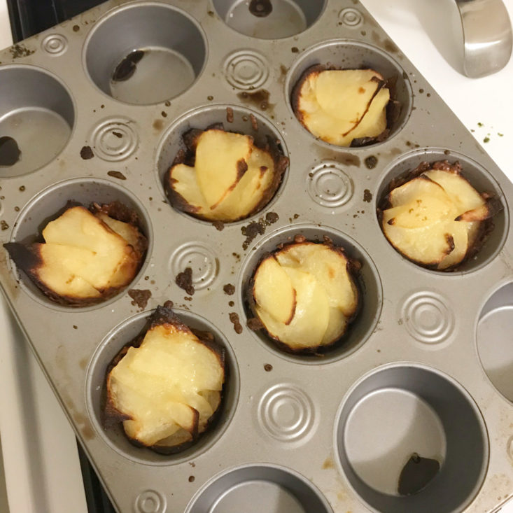 cooked potatoes presse in muffin pan