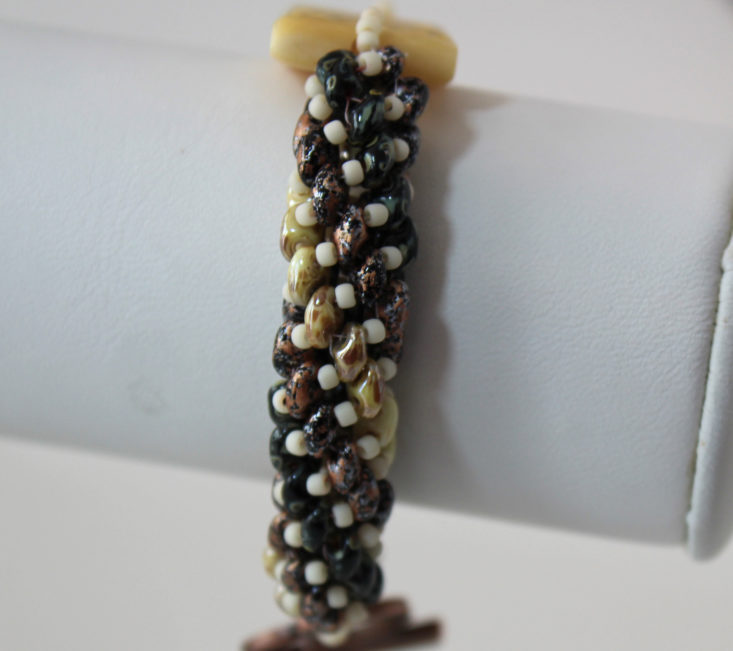 thick beads on bracelet