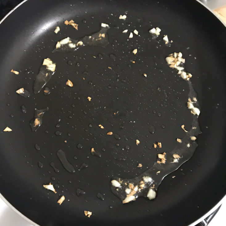 garlic cooking in pan