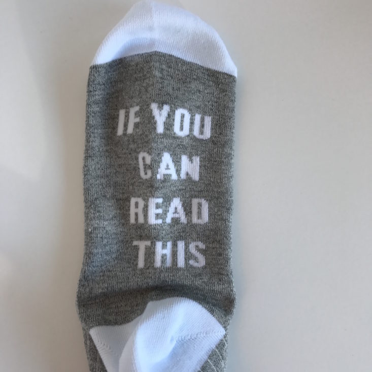 Bottom of sock with "If You Can Read This" saying