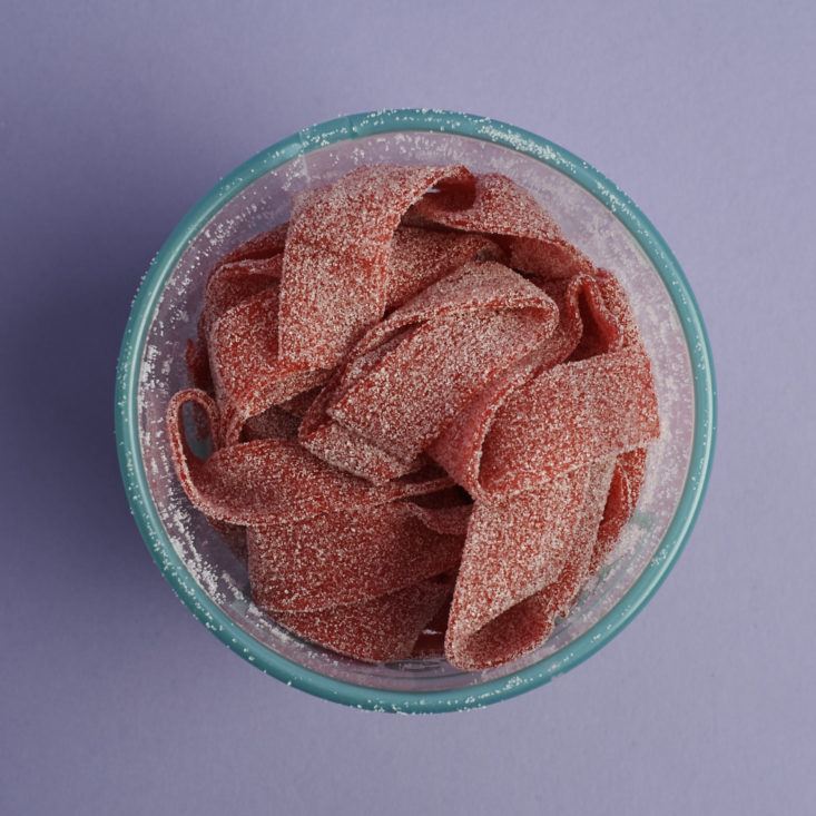 a look inside a tub of sour watermelon belts