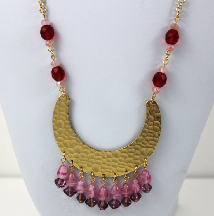 statement necklace with giant gold crescent detail