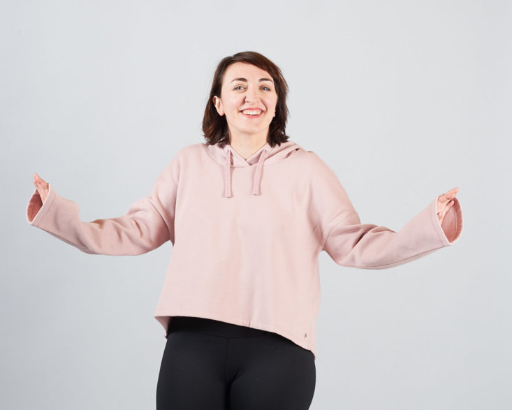 bell sleeves pink sweatshirt on model