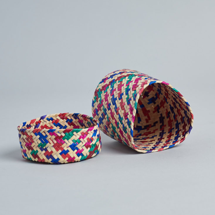 An inside shot of this red, white, and blue woven basket. It comes with a lid!