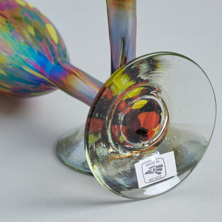 There's a made in Mexico sticker on the bottom of each rainbow champagne flute.