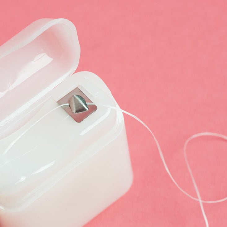 floss coming out of container