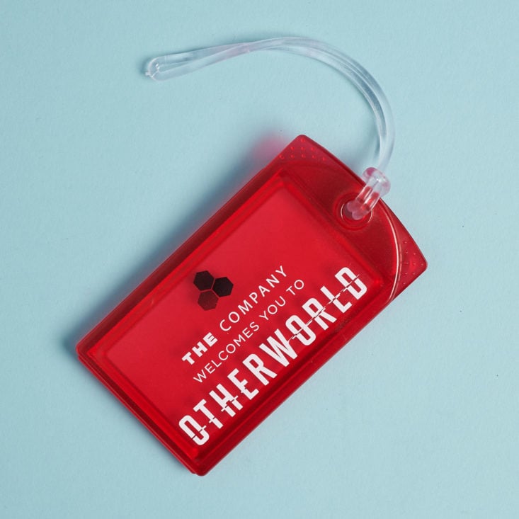 otherworld luggage tag in red