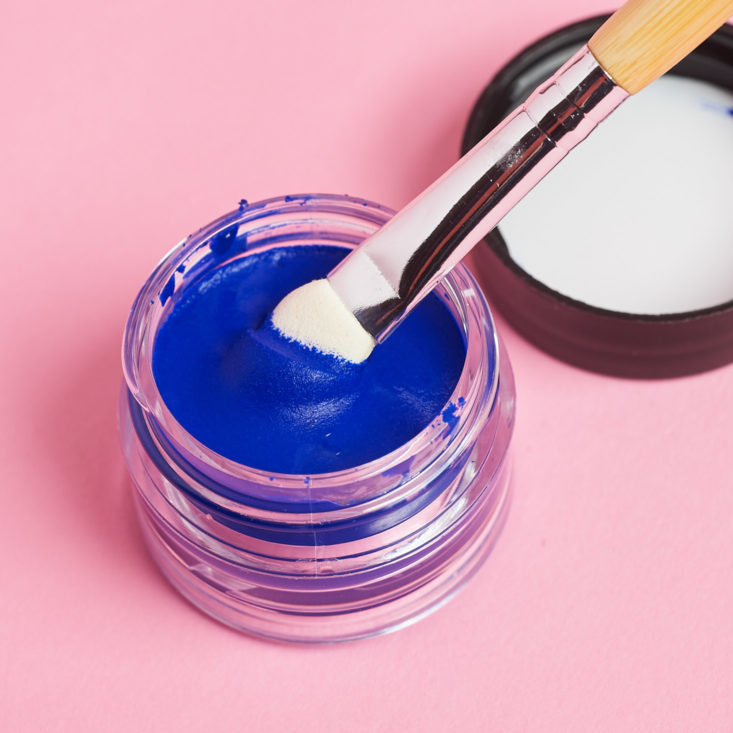 The facepaints are thick, like this bright blue one, and cling to the brush dipped inside really well.