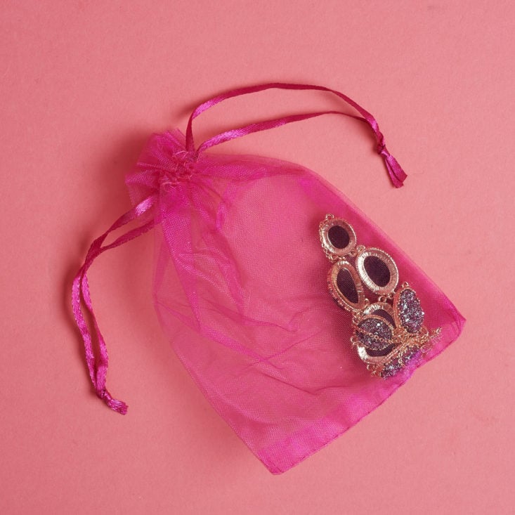 The necklace comes packed in a pink organza bag