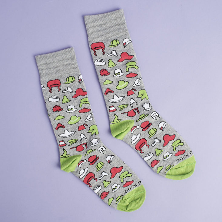 other side of grey socks with different red green and white hats