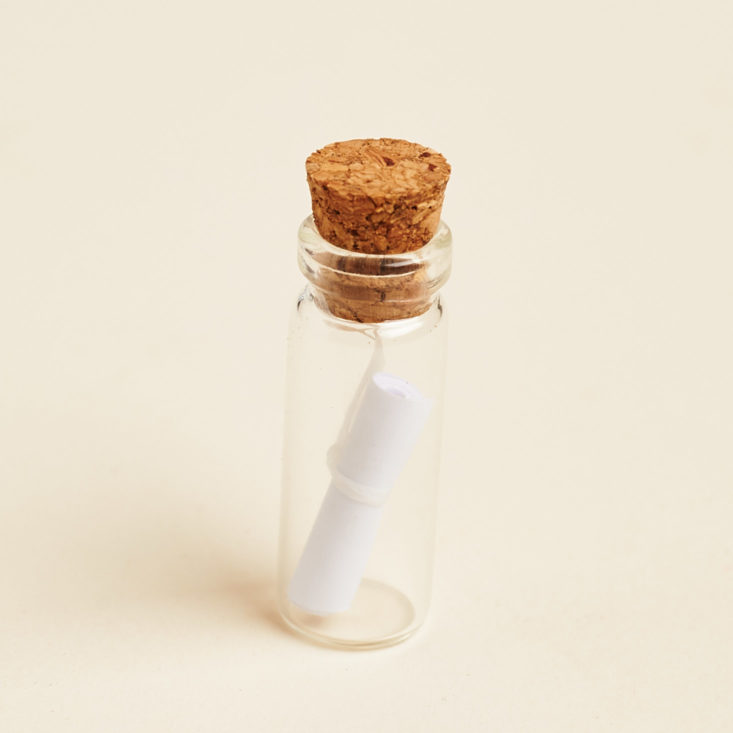 small vial with note inside