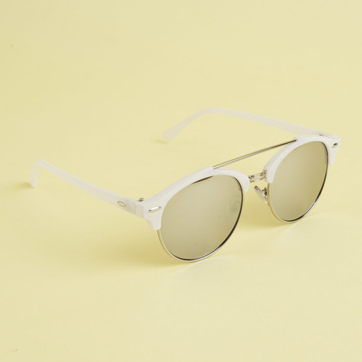 other angle of White and silver round browline mirrored sunglasses