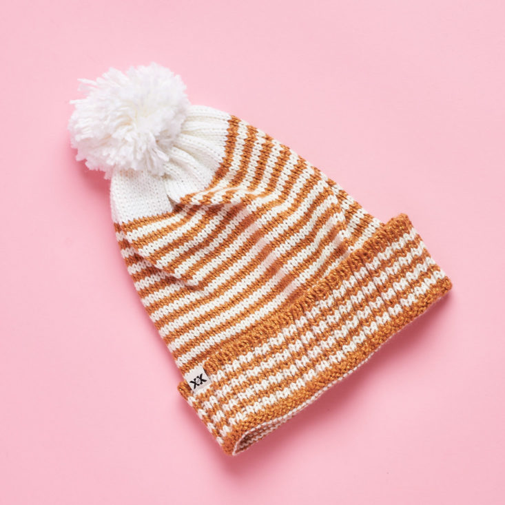 tan and white beanie