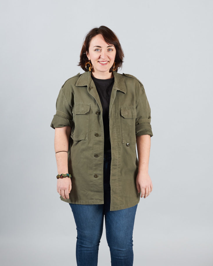 olive jacket worn by person