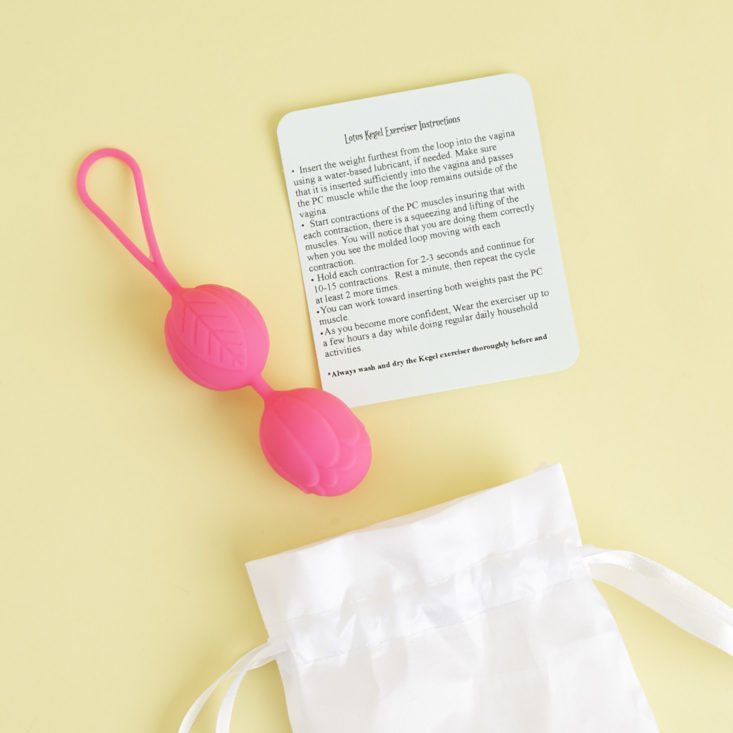 white satin heart and honey bag with info card and kegel exercise balls