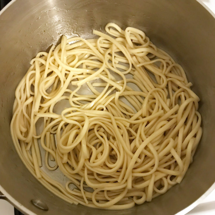 cooked lo mein noodles in pot