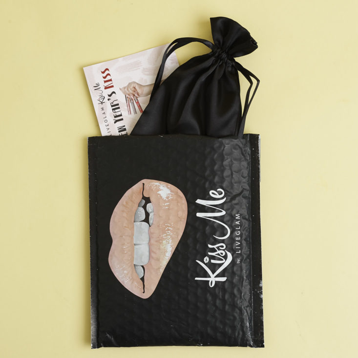 Live Glam KissMe envelope with items coming out