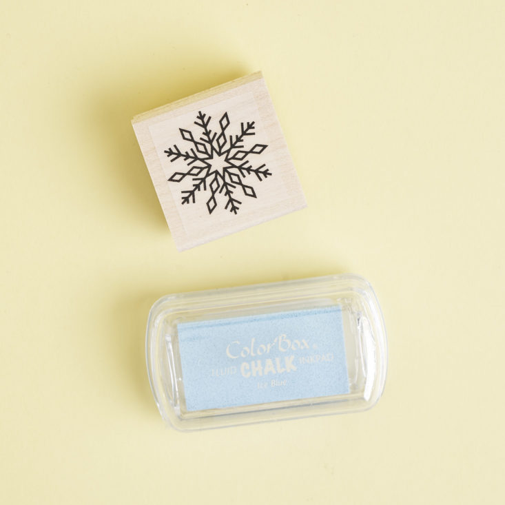 Snowflake rubber stamp with light blue ink pad