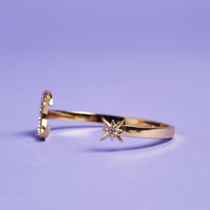 moon and star gold bangle from the side