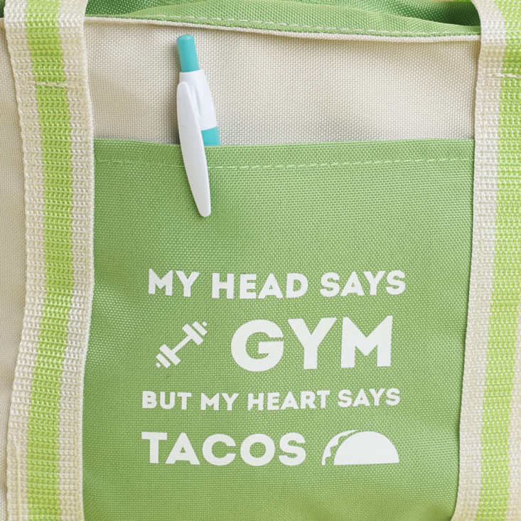 close up of My Head says gym but my heart says tacos lunch bag pocket