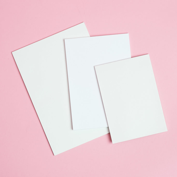 three pads of paper 