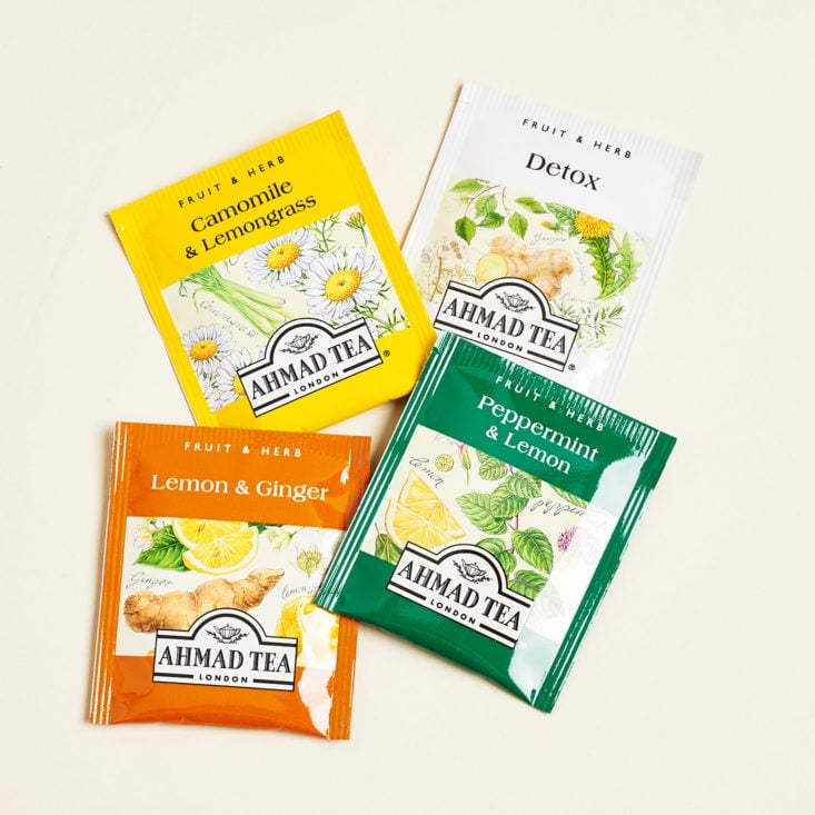 Four Ahmad Tea London Fruit and Herb Selection Teas in packages
