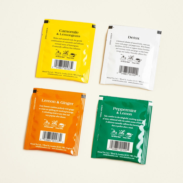 back of Four Ahmad Tea London Fruit and Herb Selection Teas in packages