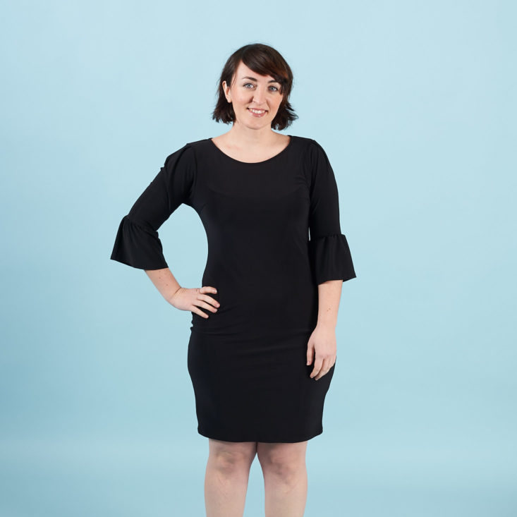 bell sleeved black dress