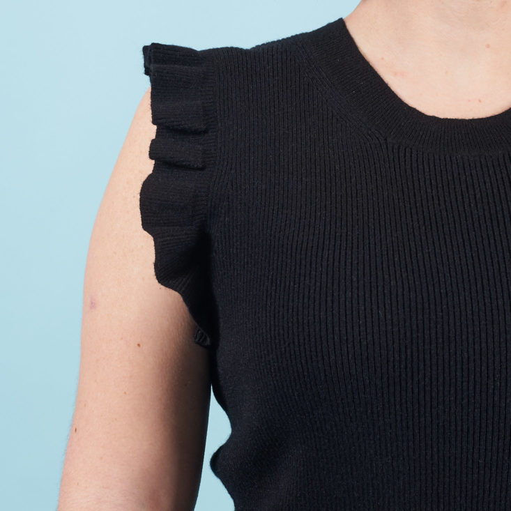 ruffle trimmed arm hole