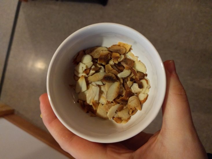 toasted almonds in cup