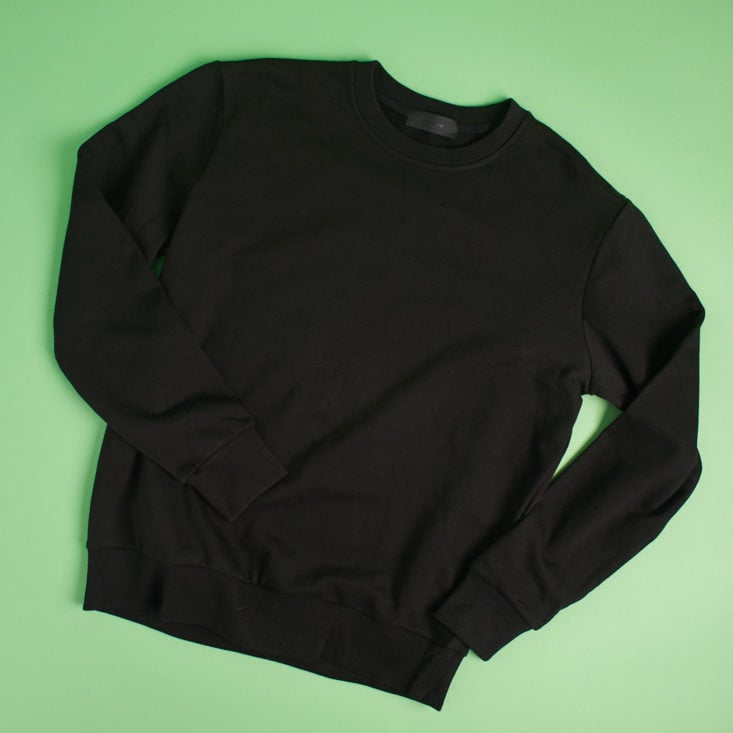 black lot sweatshirt laid flat