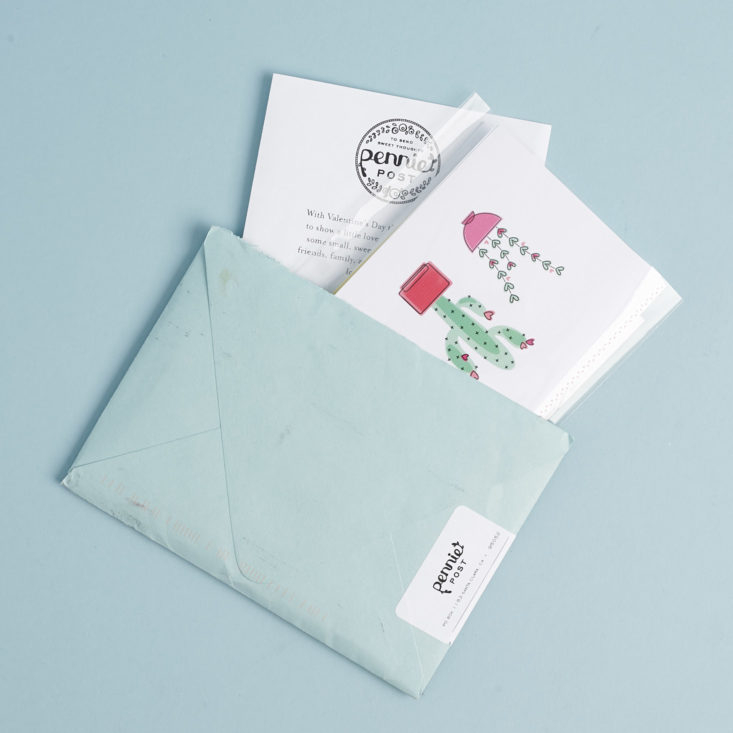 Pennie Post envelope with contents popping out