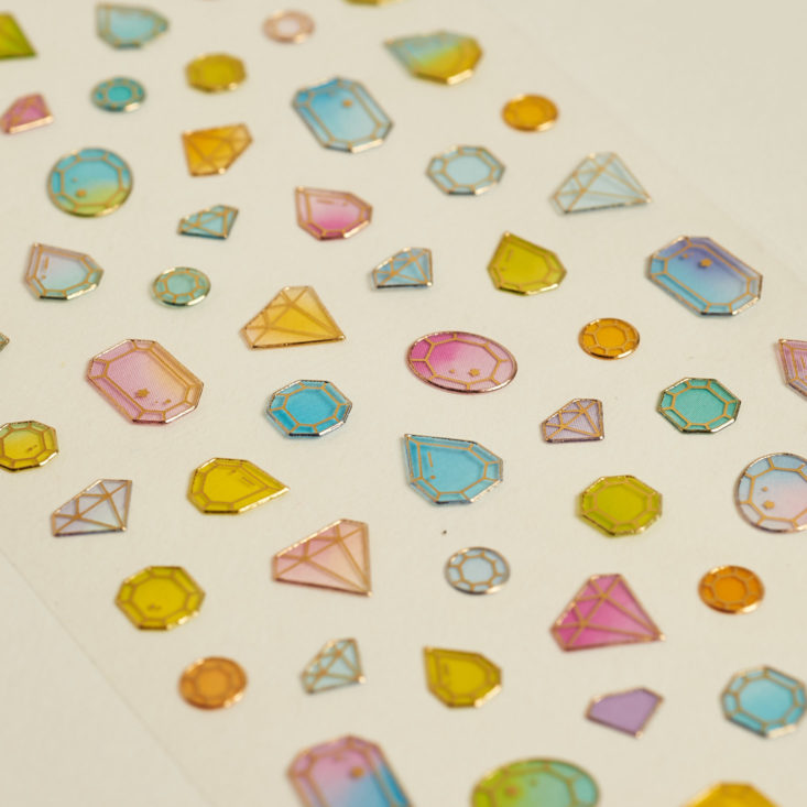 close up of tiny gemstone stickers