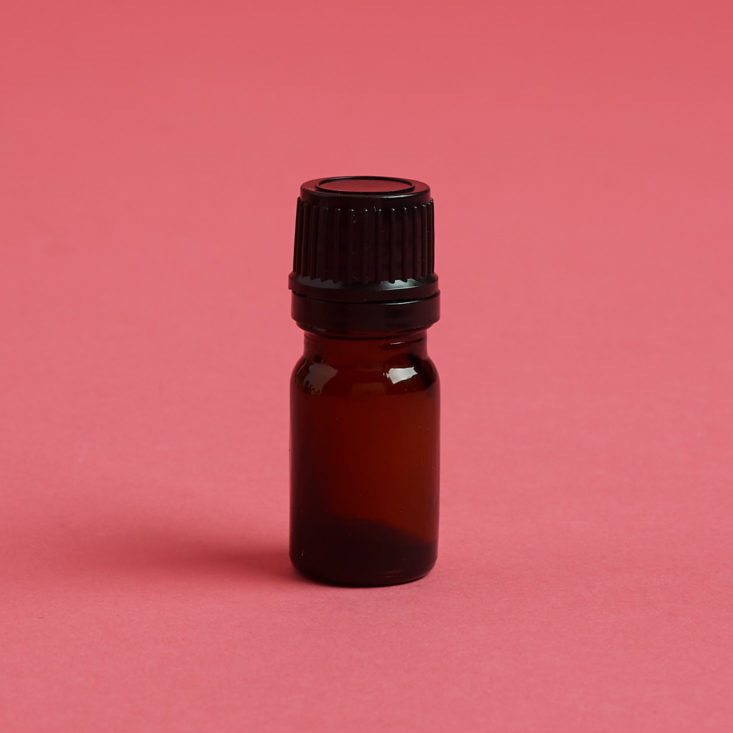 Small empty essential oil bottle