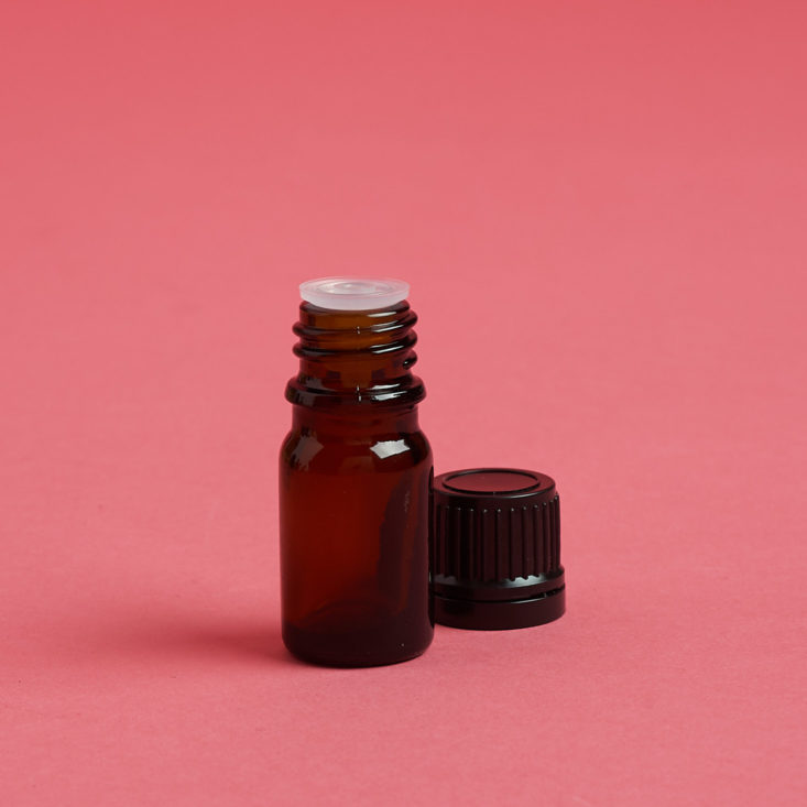 essential oil bottle with the lid off