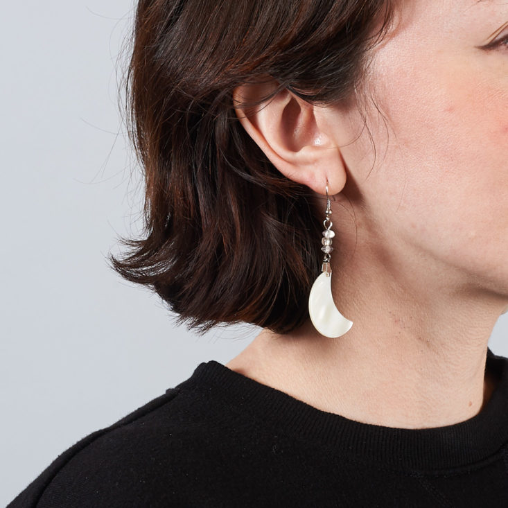 crescent moon earrings on model