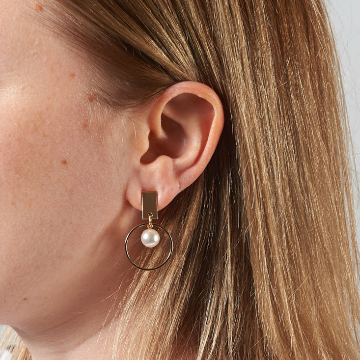 Simple Pleasure Earrings in gold, on model