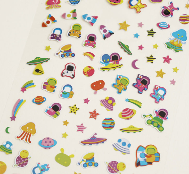 close up of metallic space stickers