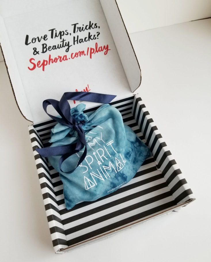 Play! By Sephora box open showing blue pouch
