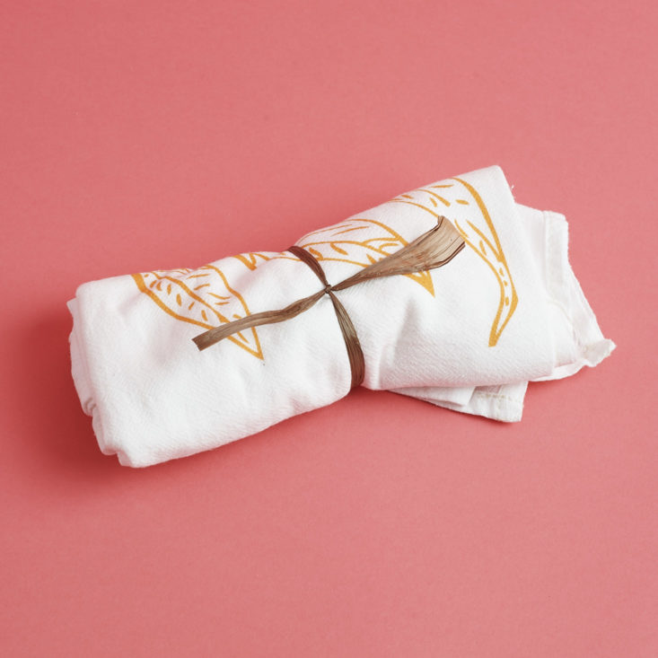 Noho Designs Turmeric Tea Towel, rolled up