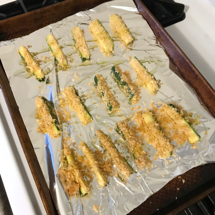 zucchini fries on baking sheet