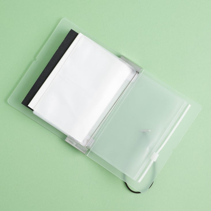 clear pockets/holders secured in binder