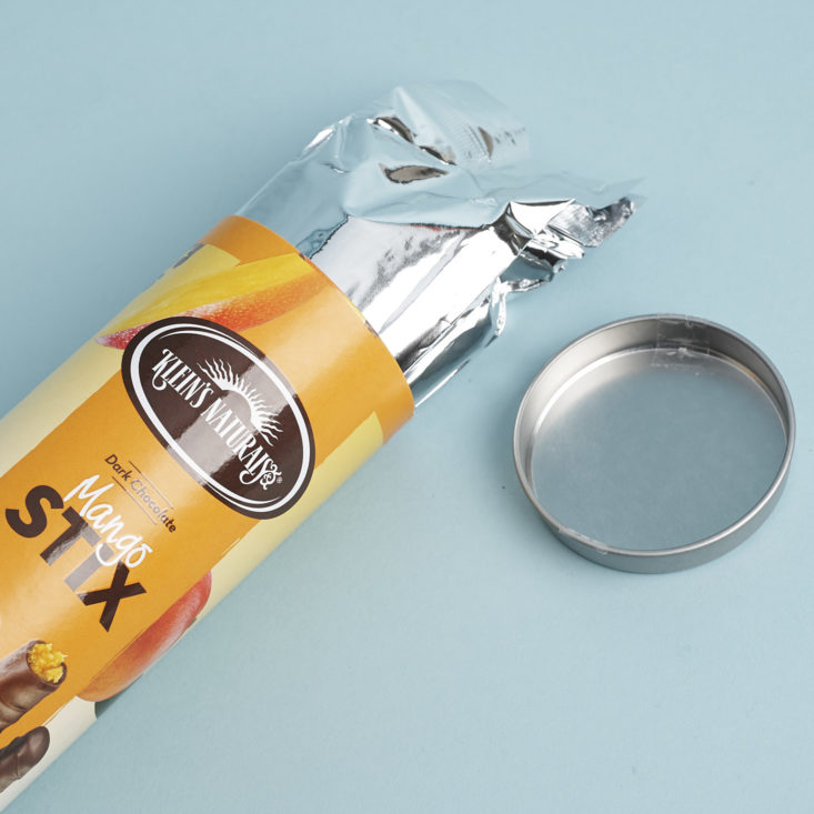 Klein's Naturals Dark Chocolate covered Mango Stix package coming out of tube