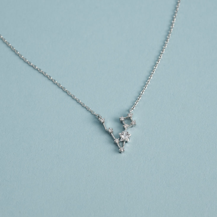 close up of Beaucoup Designs 24k white gold dipped constellation necklace
