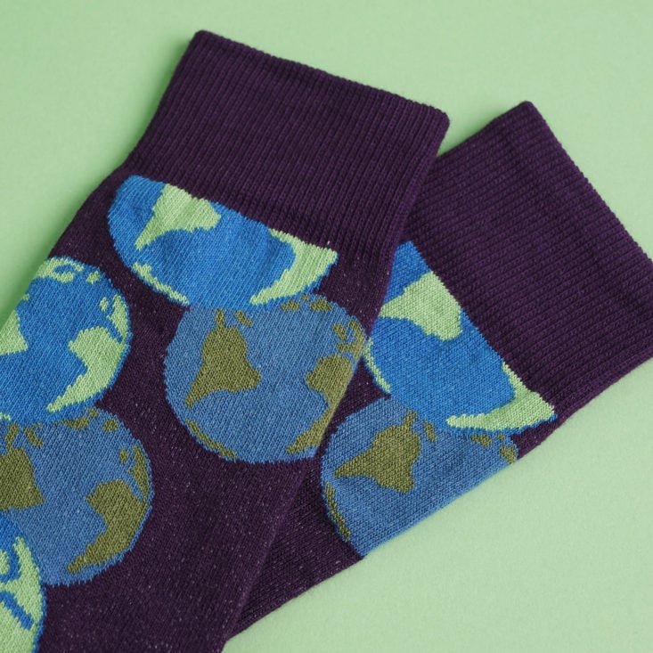 close up of Purple socks with earths