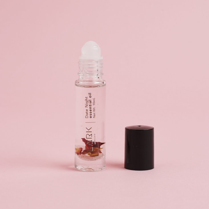 Lark crystal infused perfume Oil in "date night" with cap off