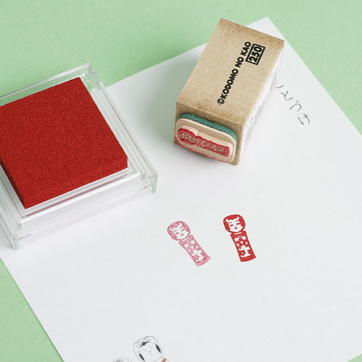 Kokeshi Rubber stamp and ink pad in use